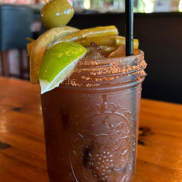 Bloody Mary garnished with pickled vegetables